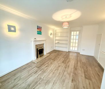 Delightful two bedroom semi-detached house with garage in this desi... - Photo 4