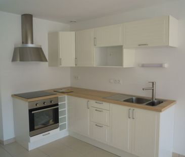 Location Maison 3 pièces 78m² - Photo 2