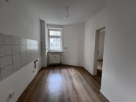 Urbanes Wohnvergnügen: Geschmackvoll renovierte 3-Zimmer-Wohnung mit Balkon! - Foto 2