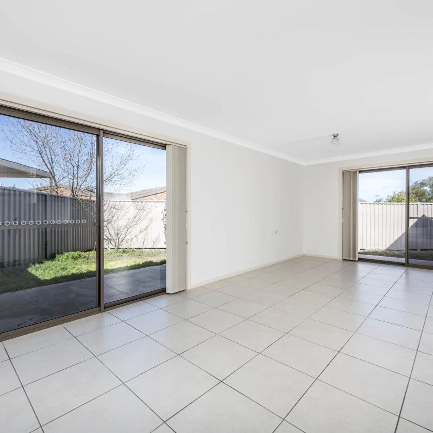 Single Level Townhouse with Lock up Garage - Photo 1