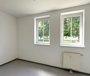 Helle Erdgeschosswohnung mit charmanter Freifläche - Photo 3