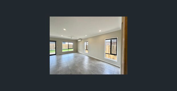 Newly built family home featuring an additional living area! - Photo 1