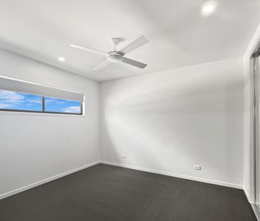 Located in popular Harmony Estate, Palmview is this stunning three ... - Photo 3