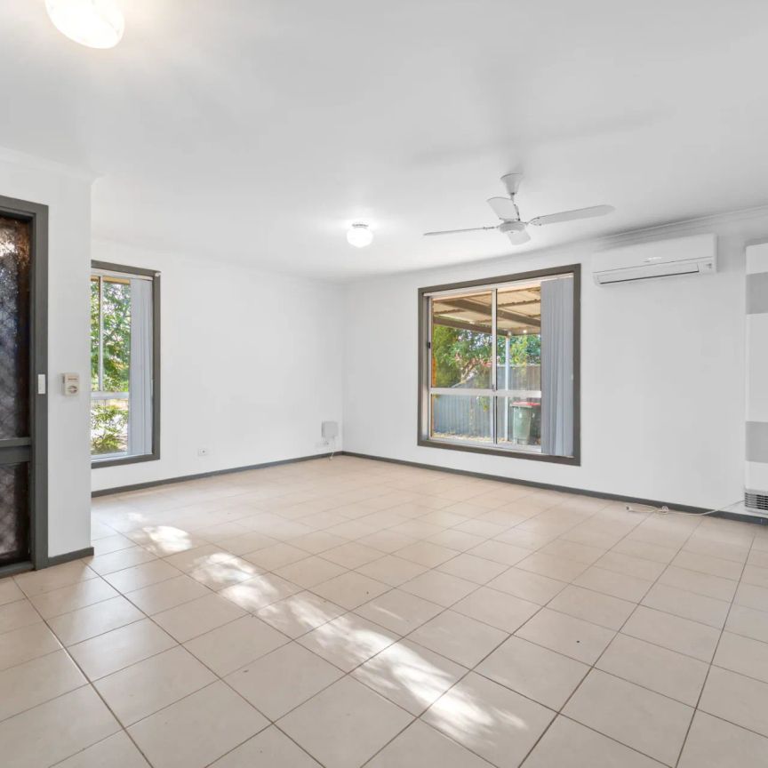 Freshly Painted Family Home with Brand New Carpet & Spacious Backyard - Photo 1