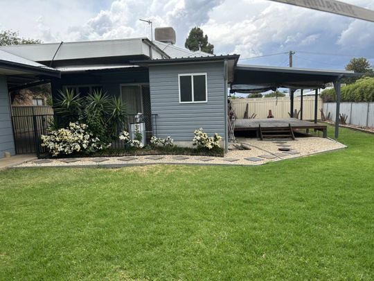 THREE BEDROOM TWO BATHROOM HOME - Photo 1