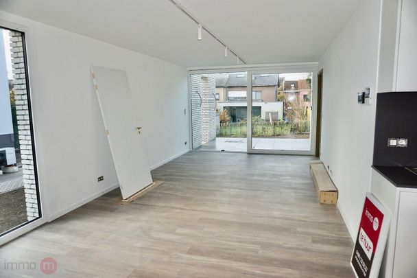 Nieuwbouw gelijkvloersappartement met 2 slaapkamers en tuin. - Photo 1