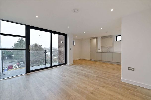 Modern newly built three bed apartment with off-street parking offering light, modern interiors in a sought after location. - Photo 1