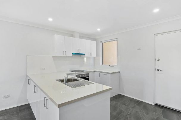 New 2 Bedroom 2 Bathroom Unit - Photo 1