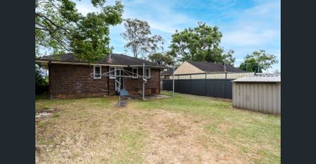 Freshly Painted 3-Bedroom Home on a Large Block - Photo 4
