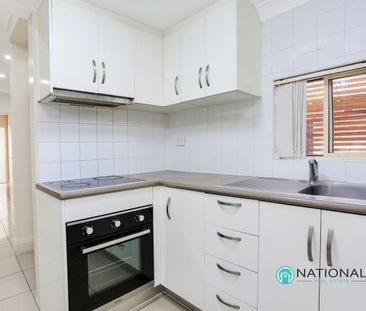 Convenience at Your Doorstep - 2 Bedroom Unit - Photo 1