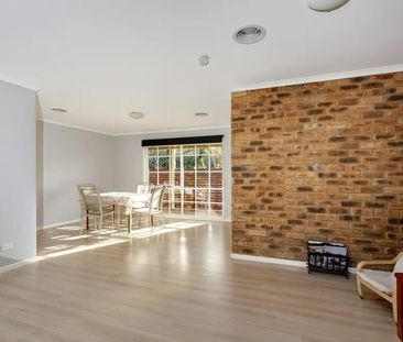 Stylish Two-Bedroom Unit in a Prime Location! - Photo 1