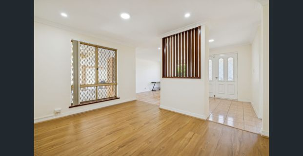 SPACIOUS 4x2x2 REPRESENTS FAMILY LIVING AT ITS BEST! - Photo 1