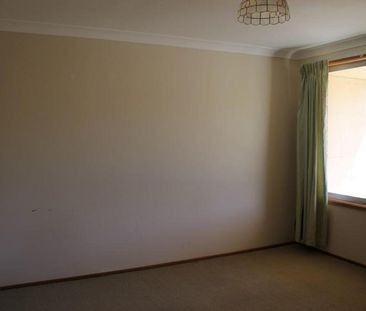 Tidy Two-Bedroom Unit in Peaceful Location - Photo 6