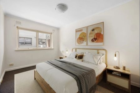 Lifestyle Living! Sunlit Two-Bedroom Apartment with Secure Parking - Photo 2