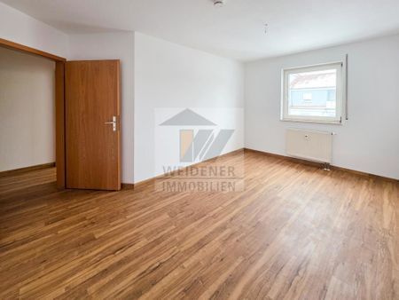Wohnfreundliche 3-Raum-Wohnung mit Balkon und Tiefgaragenstellplatz! - Foto 2
