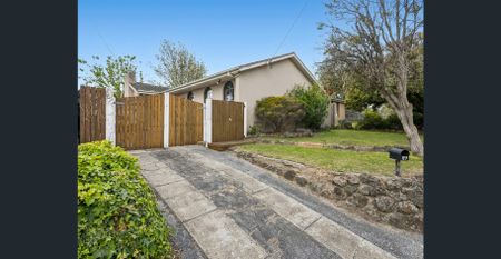 Bright, Spacious & Newly Refreshed — 4 Bedrooms Plus Versatile 5th Room - Photo 4