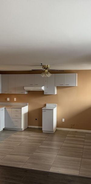Saint-Constant – Appartement 4 1/2 à louer – Demi sous-sol – Calme et paisible – Accès terrain et accès terrasse - Photo 1