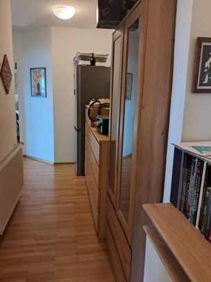 Rudolfstraße 24/5/DG: Hübsche 2-Zimmerwohnung 57,78m2 mit Blick zum Schlossberg, ablösefreie Küche, 5.Liftstock! - Photo 1