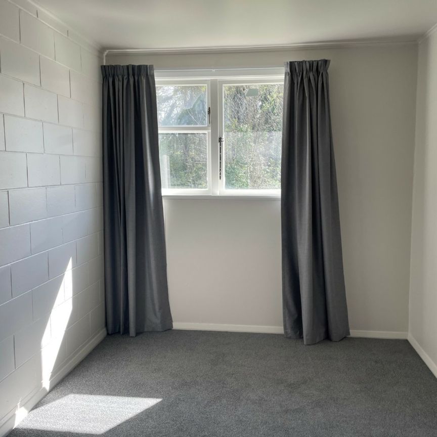 Tidy Unit Close to Town - Photo 1