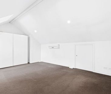 Bright and Spacious Townhouse with Private Courtyard & Double Garage - Photo 1