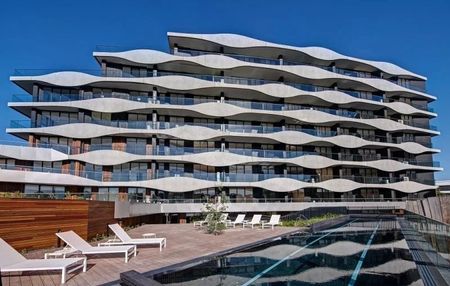 MODERN APARTMENT WITH RESORT STYLE LIVING - Photo 2