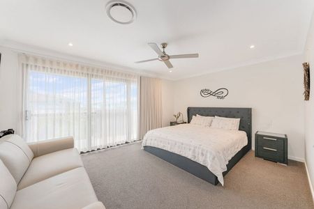 Modern and Spacious Executive Residence with views of the Lake plus Heated Pool & Solar! - Photo 2