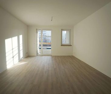 Neubau! Stilvolle 2-Zimmer-Wohnung mit Balkon & Einbauküche im Zent... - Photo 2