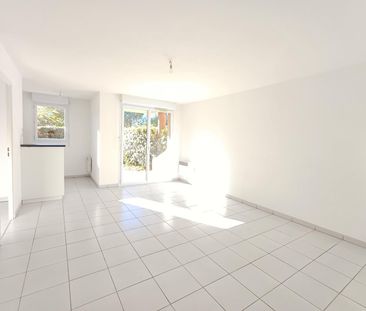 location Appartement T2 DE 40.05m² À SEILH - Photo 2