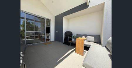 Fully Furnished Urban Retreat | Modern 2x2 Living in a Premier Lifestyle Location - Photo 3