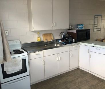 Tidy and spacious, this one-bedroom upstairs flat sits in a quiet b... - Photo 4