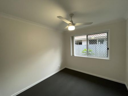 Private Oasis Backing Onto Bushland – Spacious Family Living in Prime Location - Photo 4