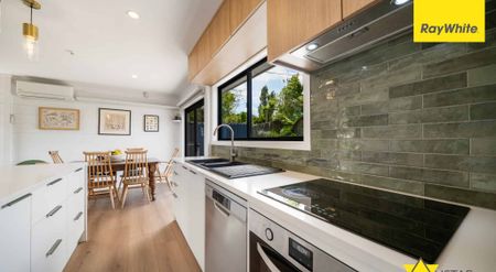 Elevated Coastal Living with Panoramic Harbour Views - Photo 2