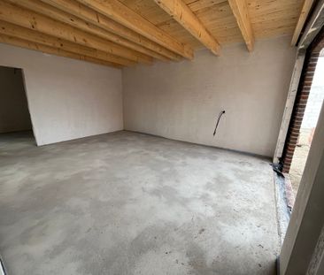 Neubauwohnung im Erdgeschoss mit großer Garage und Garten - Foto 1