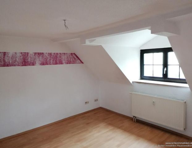 Großzügige 2-Zimmer Dachgeschosswohnung mit Abstellkammer - Foto 1