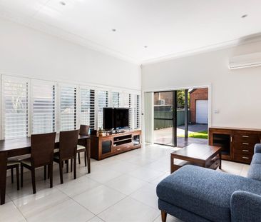 Low-maintenance family garden home - Photo 1