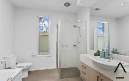 Stylish and Spacious Furnished Home with Private Garden and Modern Features - Photo 4