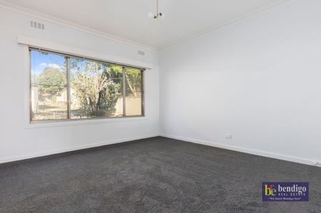 Convenient Living in the Heart of Flora Hill - Photo 2