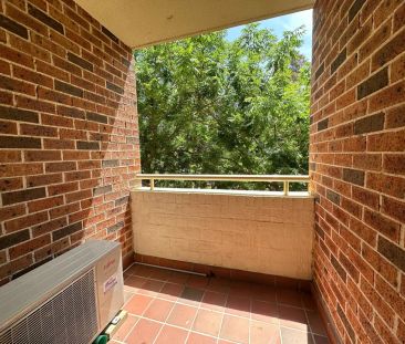 “Refreshed 2 Bedroom Unit Close to Station!” - Photo 1