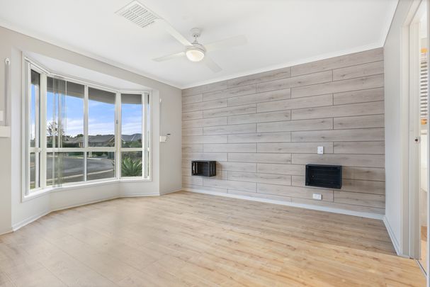 Open the door to relaxed family living with multiple living zones - Photo 1