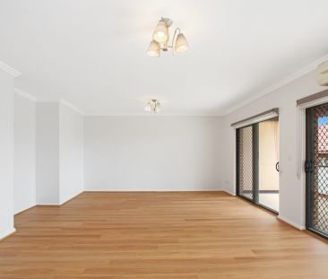 Sought After Two-Bedroom Apartment with Garage - Photo 2