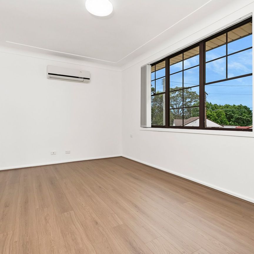 Freshly Renovated Home with Modern Comforts - Photo 1