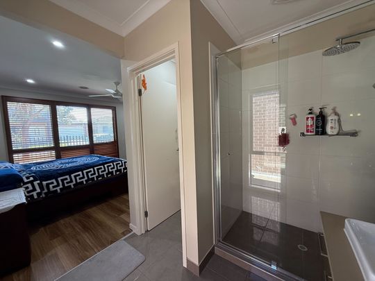 Spacious 4-Bedroom Home with Two Living Areas and Modern Upgrades - Photo 1