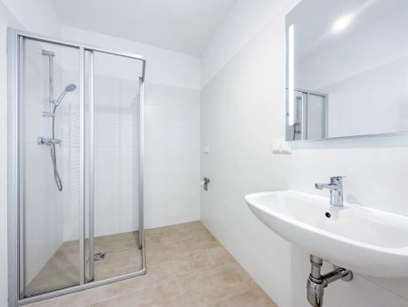 Moderner Wohntraum mit großem Balkon in zentraler Lage - Foto 4