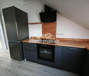 Erstbezug: Wunderschöne Dachgeschosswohnung in bester Lage - Photo 1