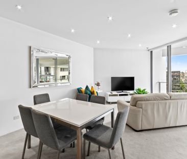 Partly Furnished Unit in Water's Edge complex - Photo 6