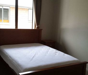 Fully Furnished Brick Townhouse – Walk to University This well-pres... - Photo 4