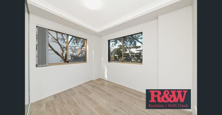 Bright & Modern 2-Bedroom Apartment in the Heart of Rockdale - Photo 5