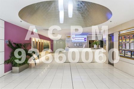 Unfurnished 2 bedroom plus car space for rent in the heart of CBD! - Photo 2