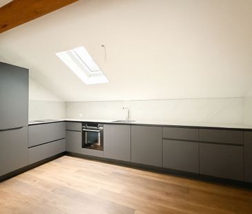 Erstvermietung nach Kernsanierung – stylish 2.5-room penthouse apar... - Photo 2