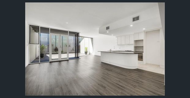 Modern Townhouse Living in the Heart of Norwood - Photo 1